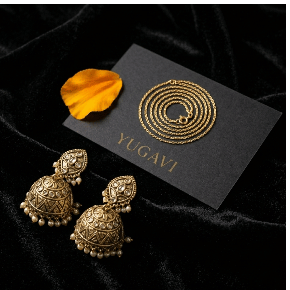 Gold jhumka earrings on black velvet — Yugavi traditional and modern jhumkas