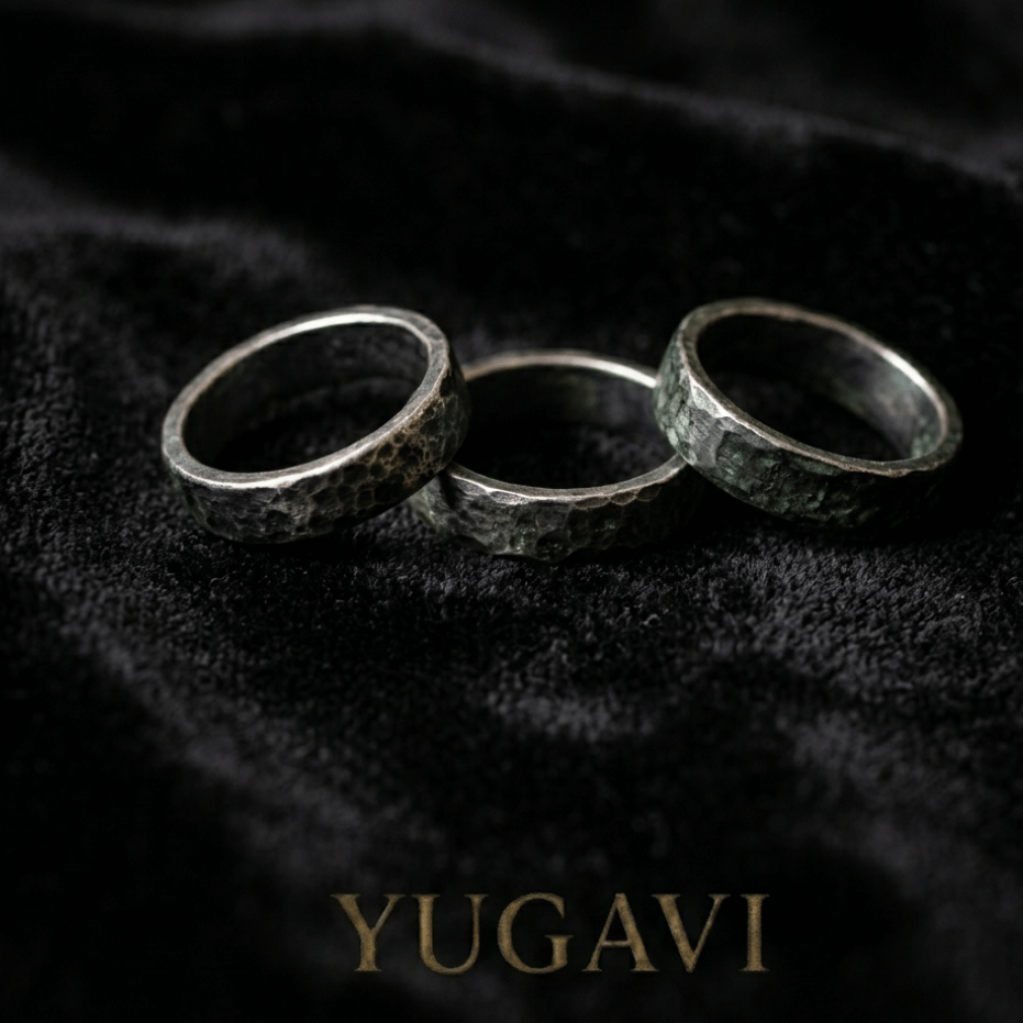 Three gold rings on black velvet — Yugavi rings collection