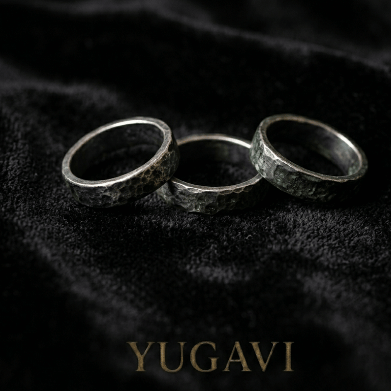 Three gold rings on black velvet — Yugavi rings collection