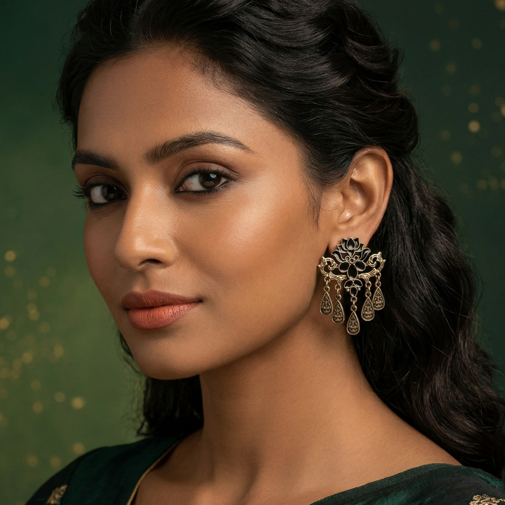 Black enamel lotus statement earrings with antique gold finish and hanging drops