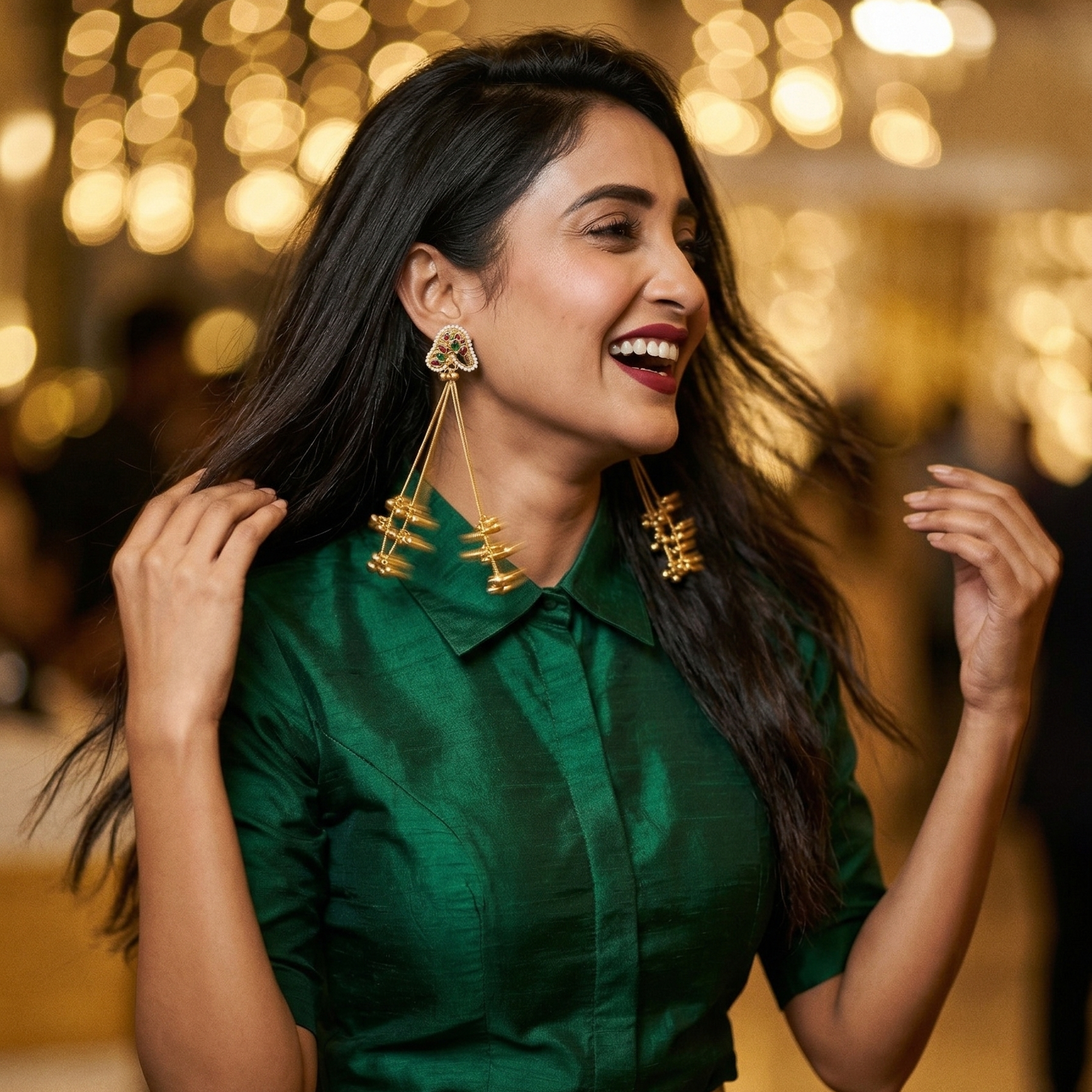 Close-up of Yugavi Jhankaar earring stud — peacock form outlined in tiny seed pearls with ruby red and emerald green teardrop cabochon stones set inside, push-back stud closure, antique gold finish