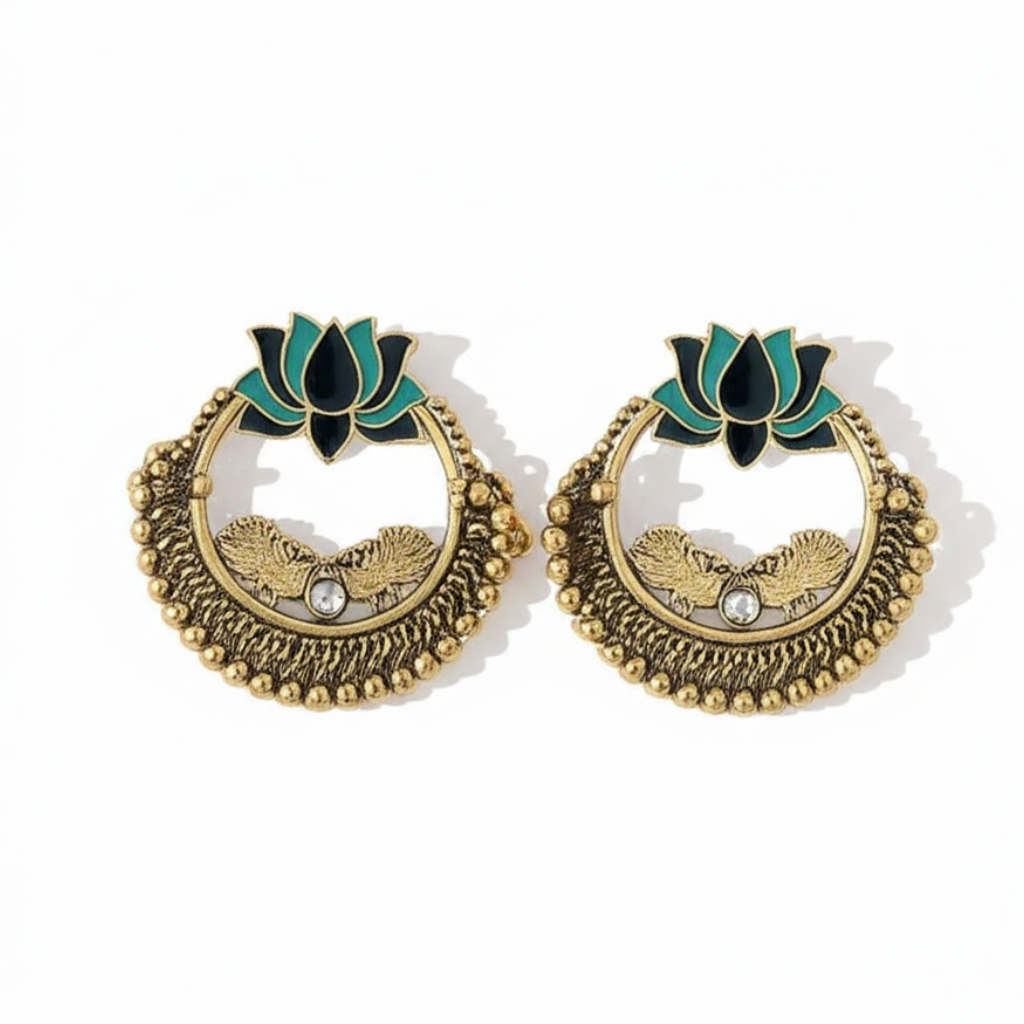 Interior detail of Yugavi Sadira earring — two engraved gold leaf or wing forms symmetrically placed inside the open circle, flanking a single white kundan stone at centre, with open negative space above and below showing light passing through