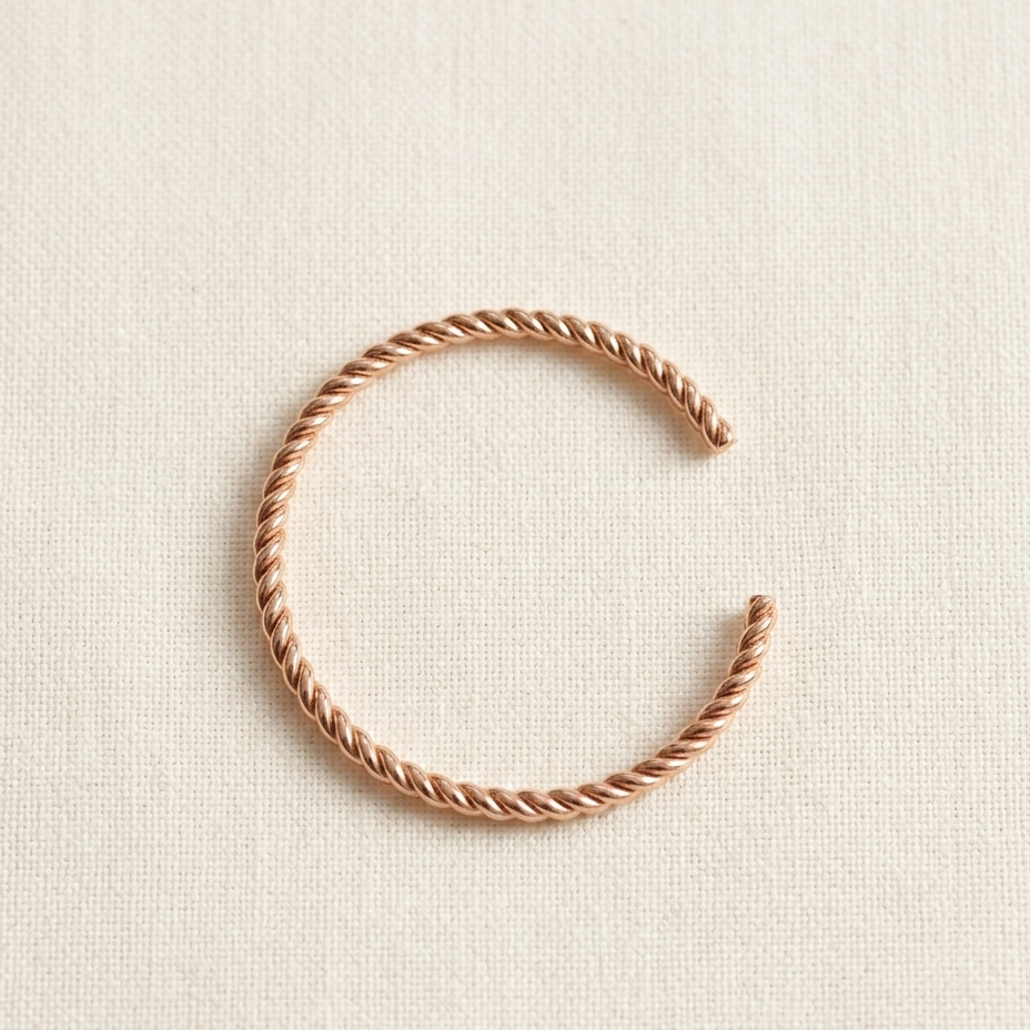 Rose gold twisted rope open cuff bangle by House of Yugavi