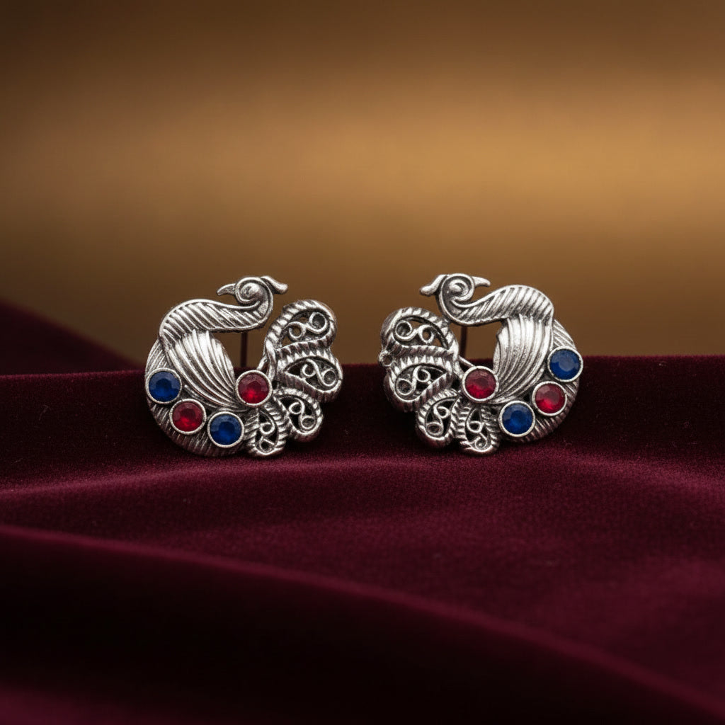 Yugavi Bugadi oxidised silver peacock ear cuff traditional Indian jewellery ruby red sapphire blue stones filigree tail no piercing Maharashtrian heritage festive bridal buy online India