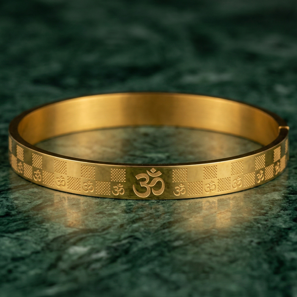Yugavi Dev Bracelet — gold flat bangle kada with Om symbol engraving and checkerboard texture — houseofyugavi.com