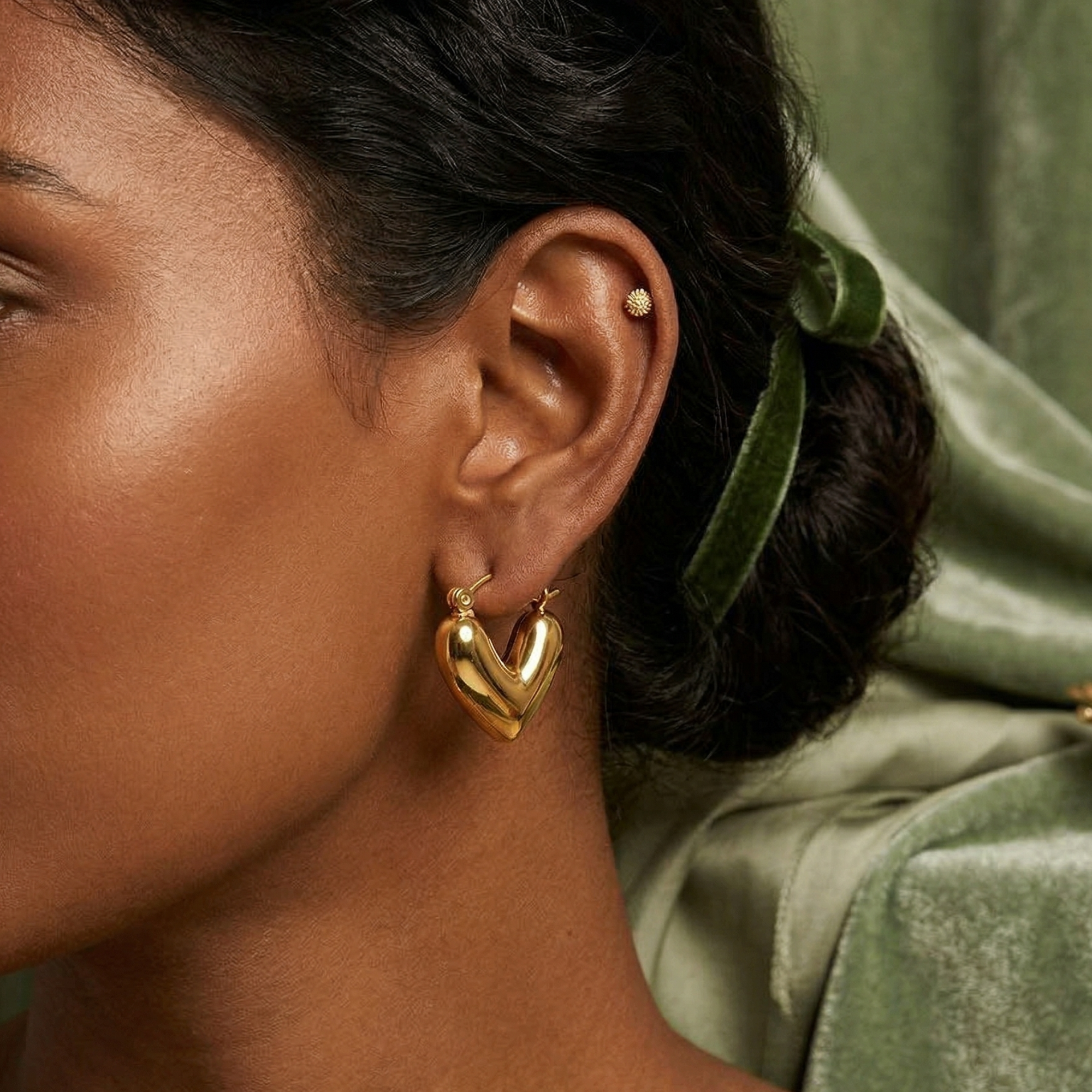 Yugavi Hridaya chunky puffy heart hoop earrings in high mirror polish 18K gold, hollow sculptural heart silhouette with open centre and hinge lock closure, front view pair 