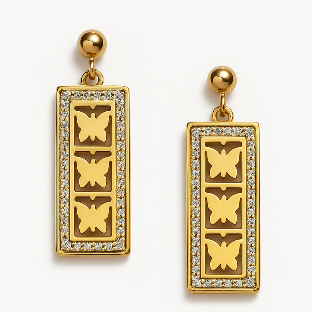 Yugavi Oorja gold rectangle drop earrings displayed as a pair on off-white background — tall rectangular gold pendant with full perimeter pavé white CZ crystal border enclosing three stacked solid gold butterfly silhouettes, large polished gold ball stud top with jump ring, bright gold finish