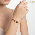 Yugavi Raksha rose gold evil eye charm bracelet worn on wrist — nazar protection bracelet — Yugavi Sacred Circle Collection — Yugavi Jewels