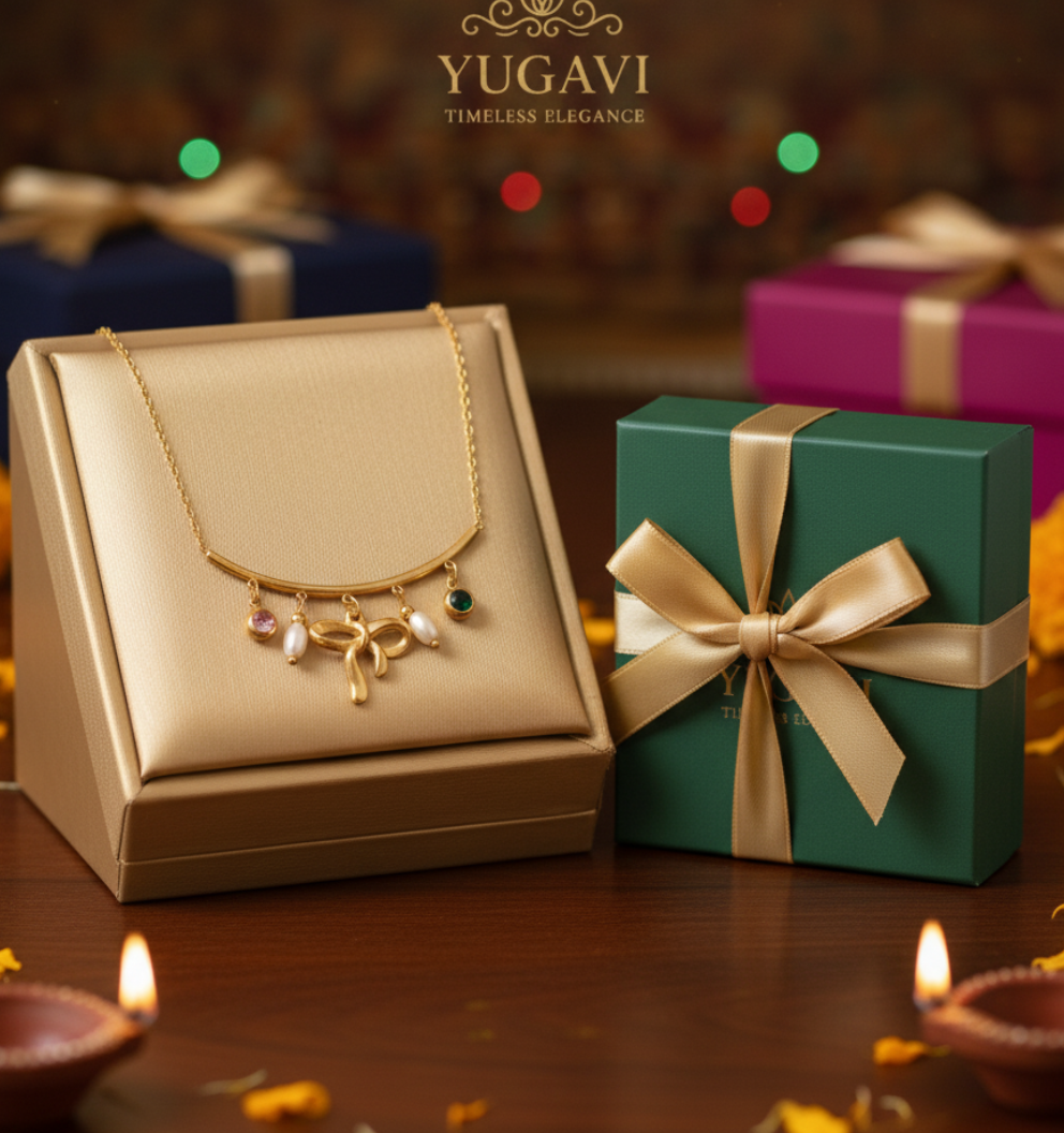 Yugavi Ribbon 22K gold plated curved bar necklace with 3D ribbon bow charm freshwater pearl drops pink and emerald green CZ stones slim adjustable cable chain daily casual office gifting Valentine birthday jewellery buy online India