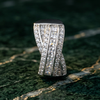 Yugavi Vajra silver rhodium cocktail statement ring with raised architectural crown, princess cut CZ centre channel and round pavé CZ flanking rows, side angle view — House of Yugavi
