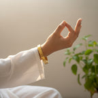 Yugavi Dev gold Om engraved bangle worn on wrist — unisex gold kada — Yugavi Sacred Circle Collection — Yugavi Jewels