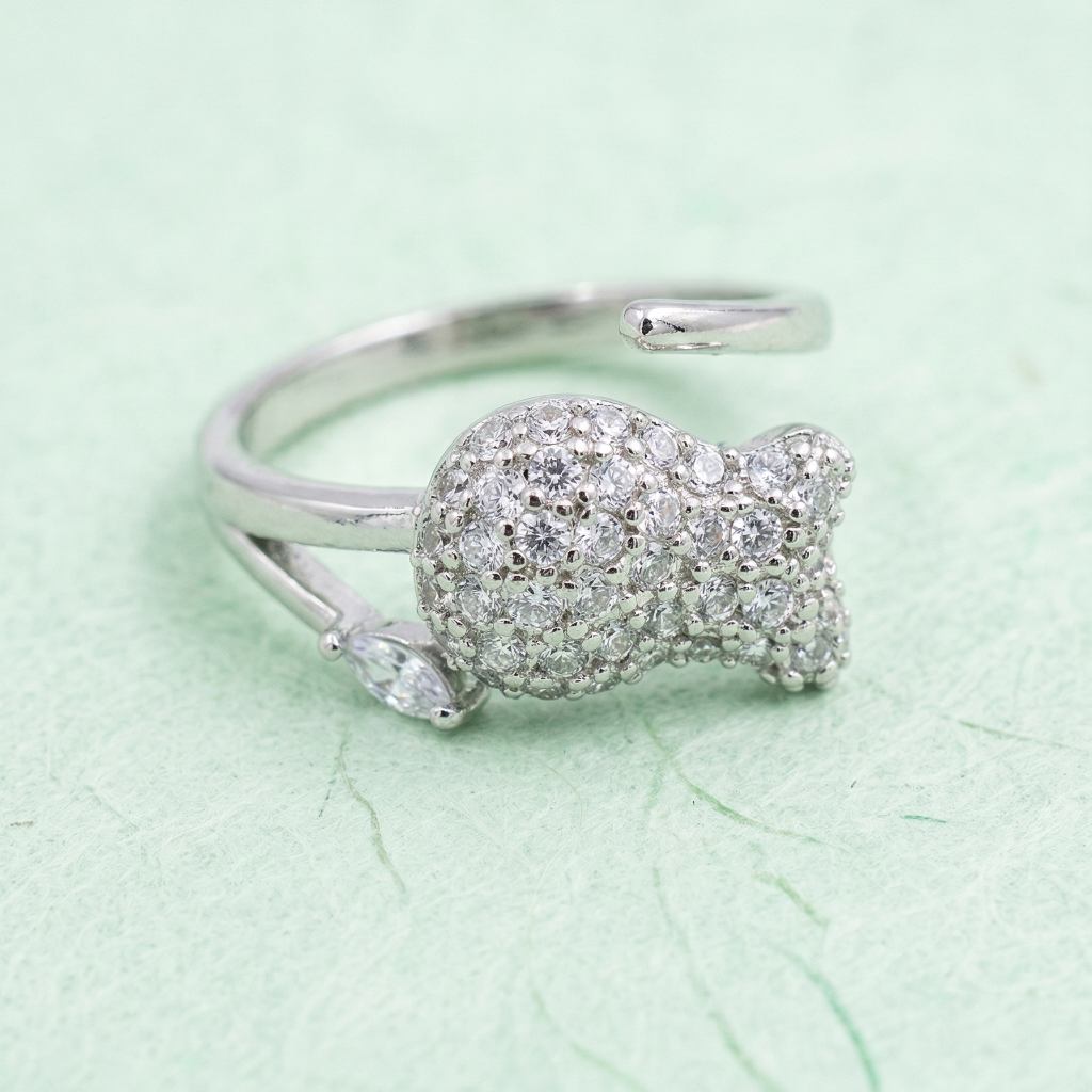 Yugavi Mishti silver pavé cat face bow ring worn on finger — cute CZ adjustable ring — Yugavi Feminine Edit — Yugavi Jewels